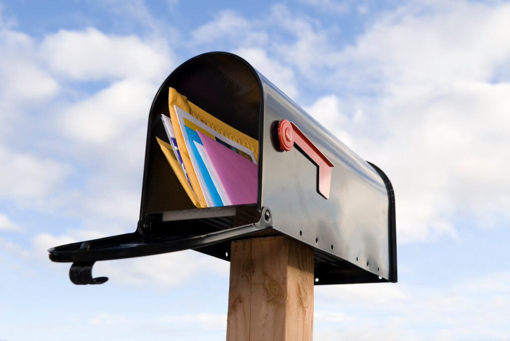 A mailbox with mail inside
